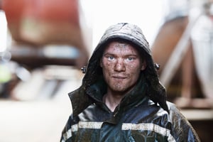 portrait-of-young-male-boat-builder-in-shipyard-wo-2024-10-18-14-42-31-utc