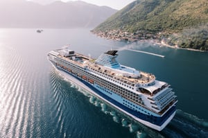 tall-huge-cruise-ship-sails-across-the-blue-sea-a-2024-07-29-17-38-38-utc